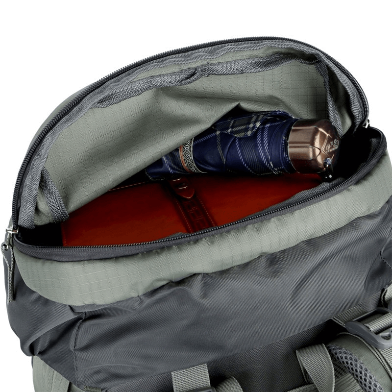 Open hiking backpack SF0296 showing spacious interior with a rain cover and books. Water-resistant and perfect for outdoor adventures.